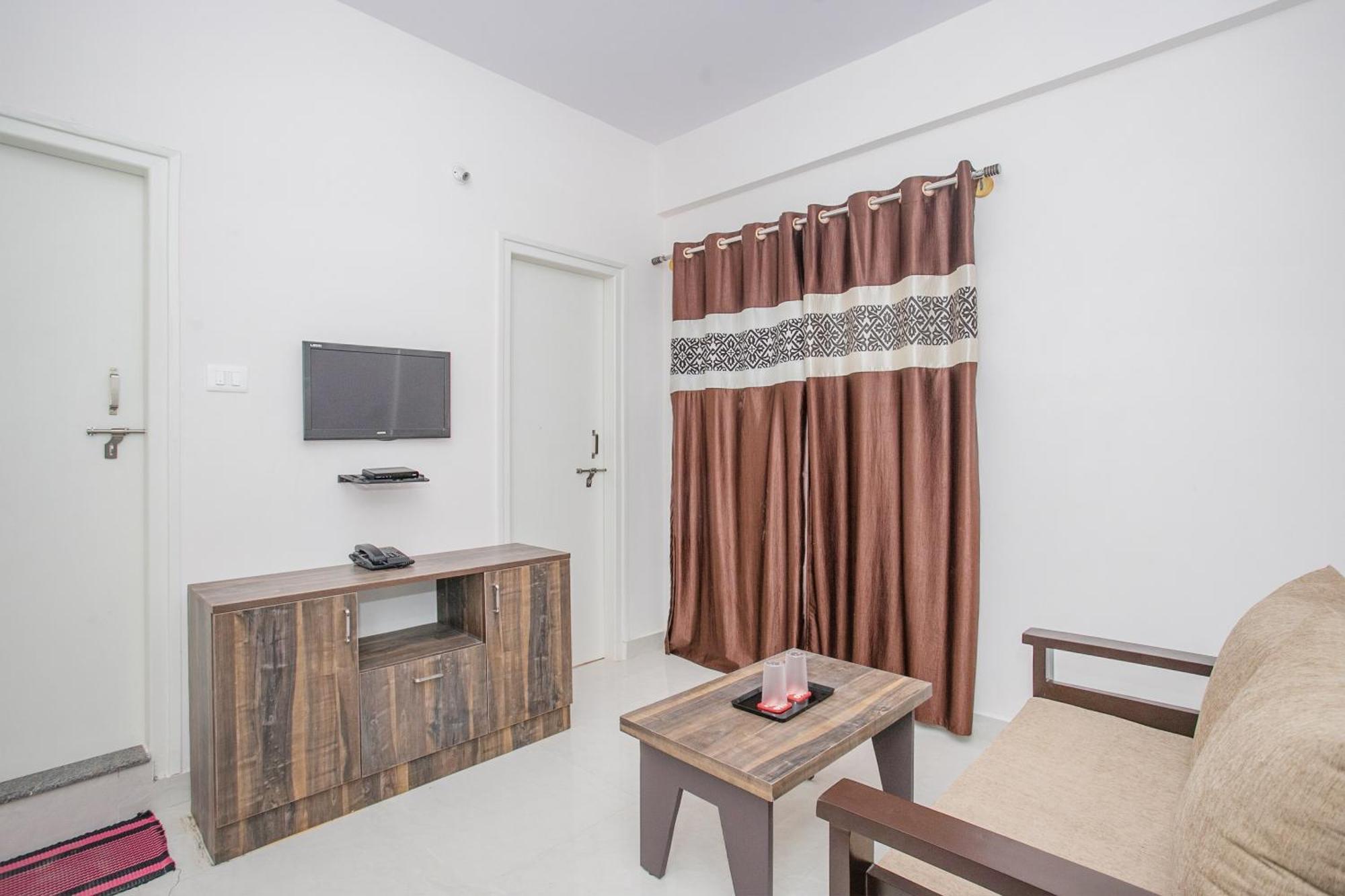 Oyo 13120 Ambrosia Hotel Bangalore Bagian luar foto