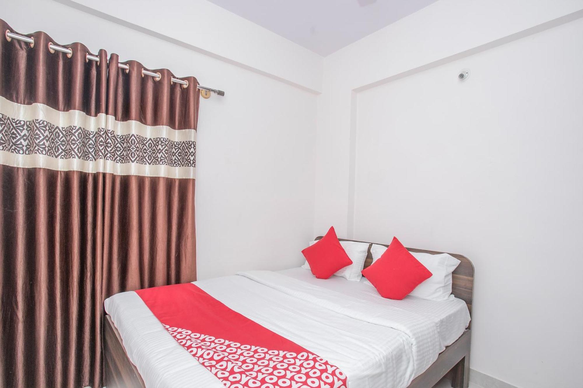 Oyo 13120 Ambrosia Hotel Bangalore Bagian luar foto